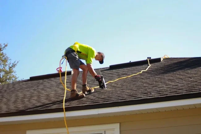Roofing professional at work