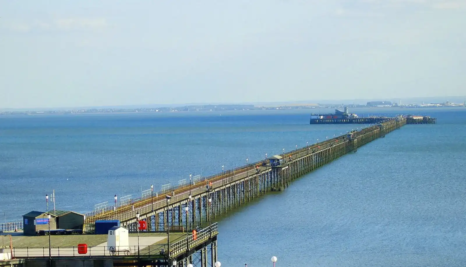 Southend Pier stretching out into the Thames Estuary, seen from the shore