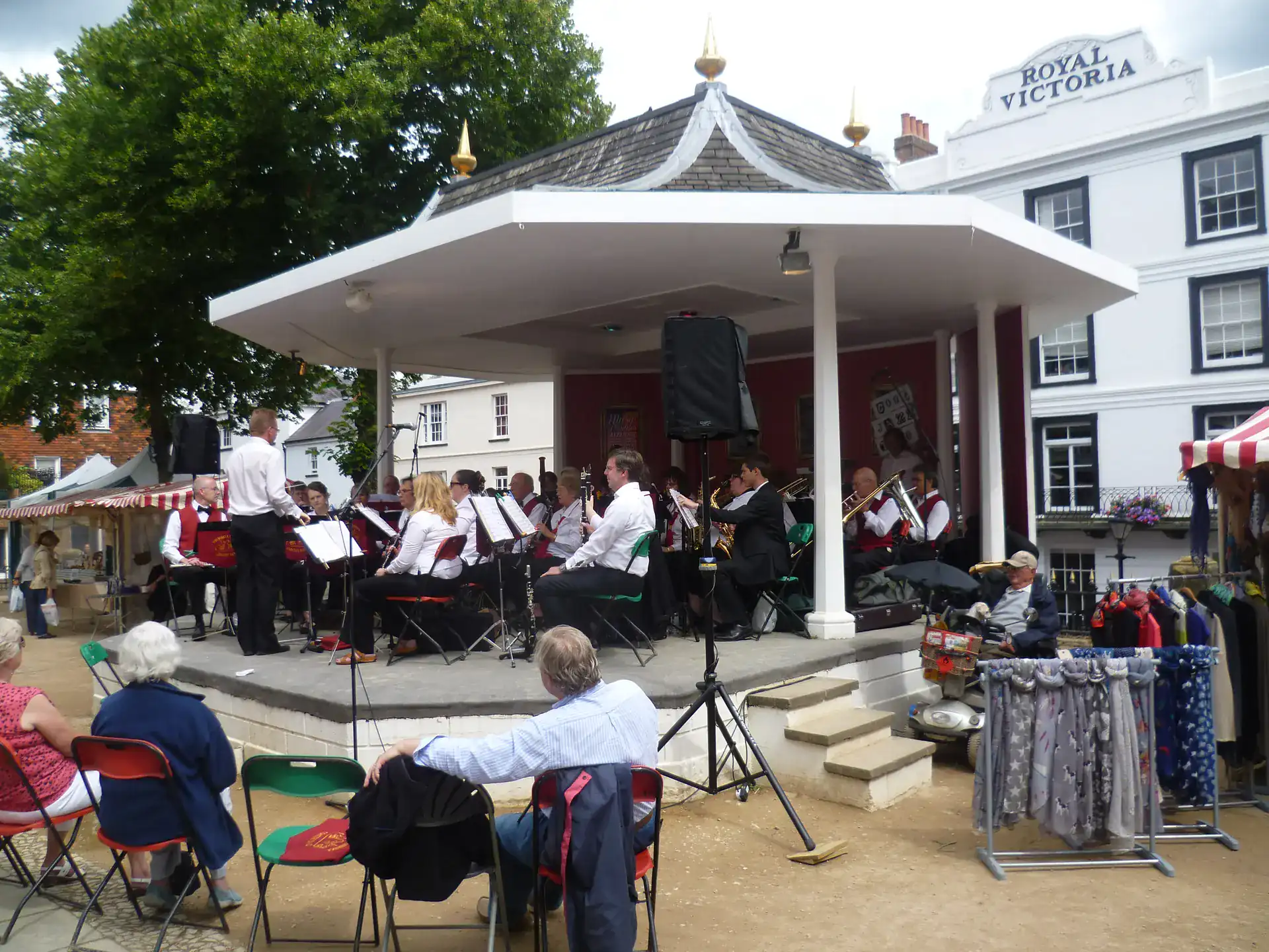 The bandstand on the Pantiles in Tunbridge Wells, with a band playing to a seated audience